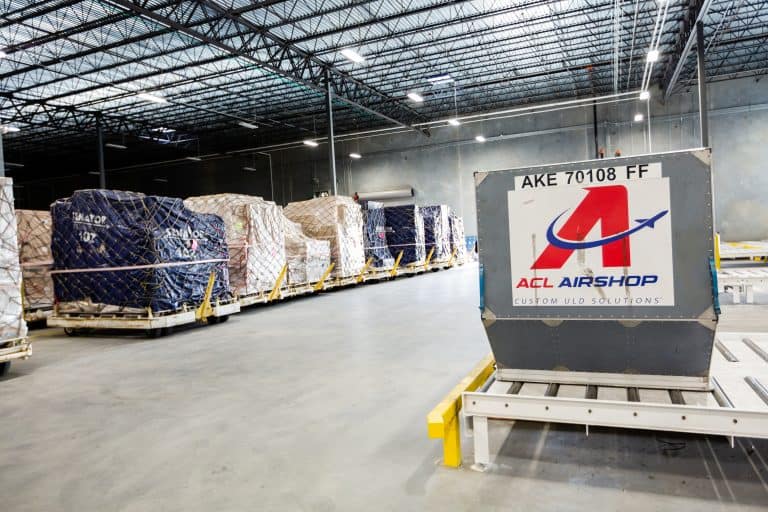 Pallets of cargo inside a warehouse at GSP Airport